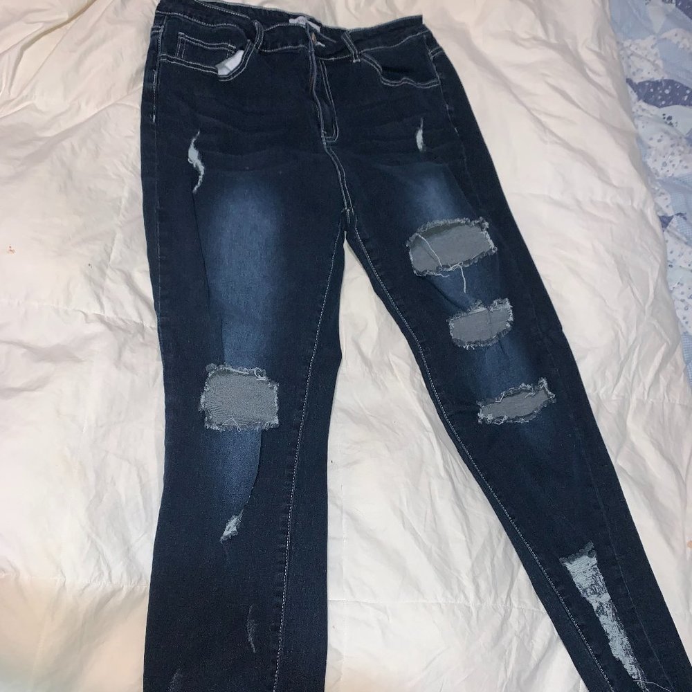 Bootcut distressed stretch jeans